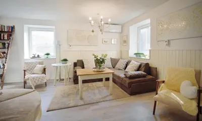 a living room with a couch and a table at Apartment Micnek Bled in Bled