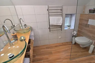 a bathroom with a sink and a toilet at Apartment Micnek Bled in Bled