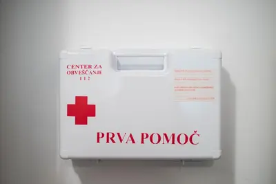 a white box with a red cross on it at Apartment Zoya in Kranjska Gora