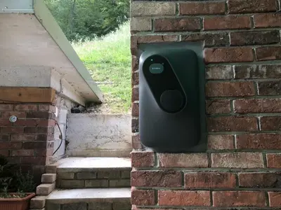 a soap dispenser on the side of a brick wall at Farm stay Žurej in Šentjur