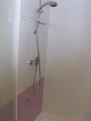 a shower in a bathroom with a glass door at Motel Sofia in Sežana