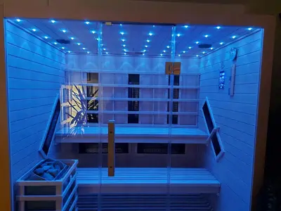 a sauna with blue lights in a room at Vila Ana Generoes Bled in Bled
