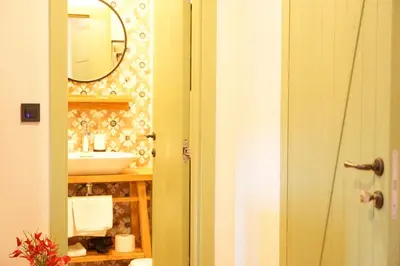 a bathroom with a sink and a mirror at Tourist Farm Zelinc in Cerkno