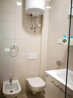 a small bathroom with a toilet and a sink at Appartma Katja in Gabrovica pri Črnem Kalu