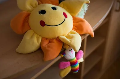 a group of stuffed animals sitting on a shelf at Apartma Ela in Bled