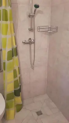 a shower in a bathroom with a shower curtain at Relax in Črni Kal 2 in Črni Kal
