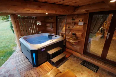 an overhead view of a large tub in a cabin at Forest Glade Cottage - Koča na jasi in Rečica ob Savinji