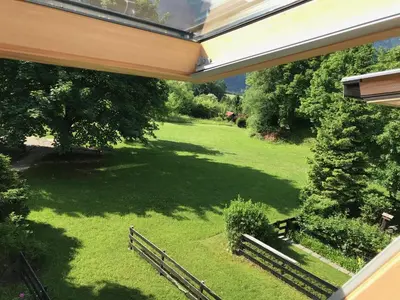 a view of a yard from the balcony of a house at Apartment Aly in Bovec