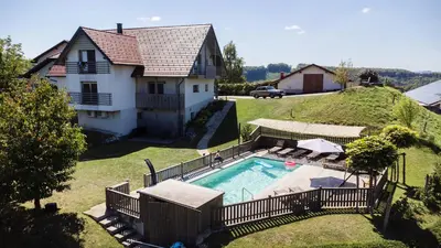 an aerial view of a house with a swimming pool at Relax Guest House Marjanca in Rogaška Slatina