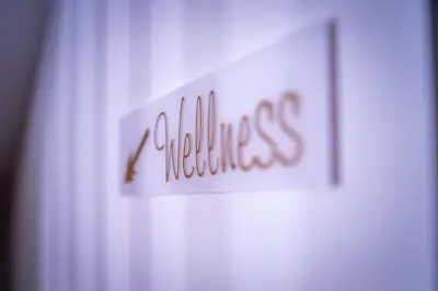 a sign for a hotel with the word wellness on it at Villa Nena in Kranjska Gora