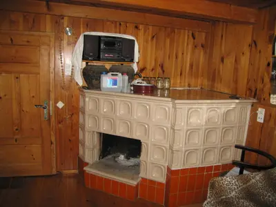 a lego fireplace with a microwave on top of it at Holiday Home Carovina in Paradiž