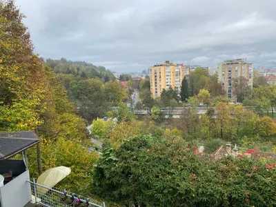 a view of a city with trees and buildings at apartma Golovec in Ljubljana