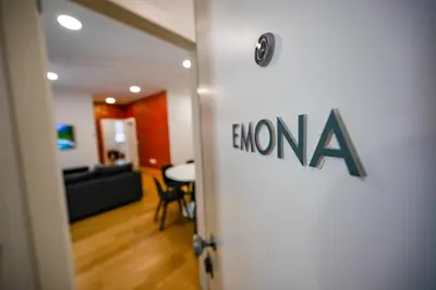 an open door to a room with a living room at Argo Apartments in Ljubljana