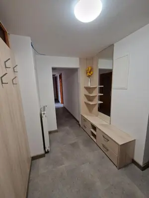 a room with a dressing room with a large mirror at Apartment Ravnik Brod 13 in Bohinj