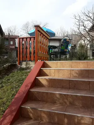 a set of stairs leading up to a playground at APARTMA SABOTIČ in Sedula
