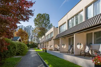 a walkway next to a building at Ljubljana Resort Hotel & Camping in Ljubljana