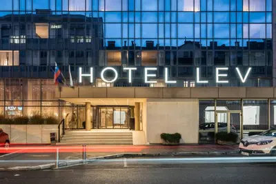 a building with the hotellez sign on it at Exe Lev in Ljubljana