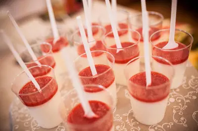 a group of glasses filled with a drink on a table at ECO Hotel Center Postojna in Postojna