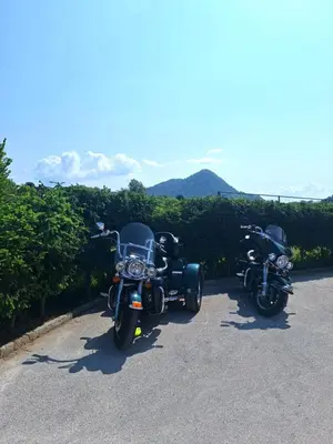 two motorcycles parked next to each other on a road at Pri Ancki Sobe Rooms Accomodation Ljubljana suburbs in Medvode
