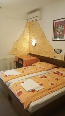 a room with three beds and a staircase at Pri Ancki Sobe Rooms Accomodation Ljubljana suburbs in Medvode