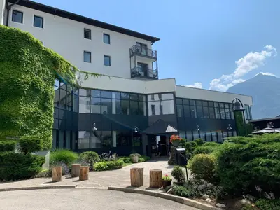 a large building with a lot of windows at Hotel Alp in Bovec