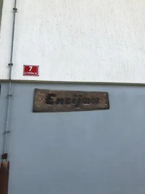 a sign on the side of a building at Apartma Vintage Bohinj in Bohinj
