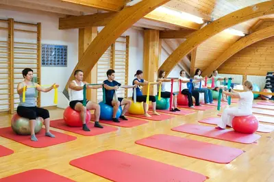 a group of people doing yoga in a gym at Terme Zrece - Hotel Vital in Zreče
