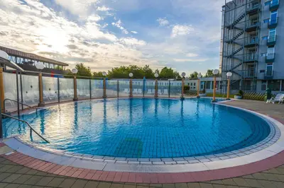 a large swimming pool in the middle of a building at Hotel Radin, Radenci Spa Resort - Sava Hotels & Resorts in Radenci