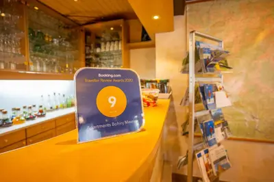 a sign on a counter in a store at Apartments Bohinj Mavrica in Bohinj