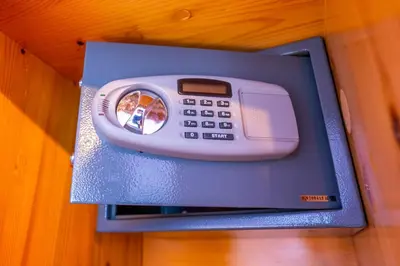 a microwave with a phone inside of it at Apartments Bohinj Mavrica in Bohinj