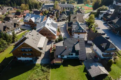 an aerial view of a village with houses at Apartments Telemark Kranjska Gora in Kranjska Gora