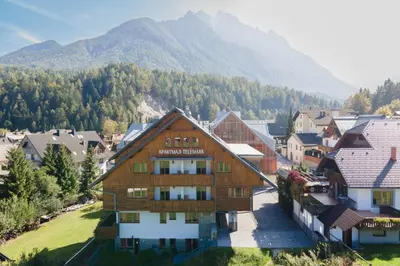 an aerial view of a town with mountains in the background at Apartments Telemark Kranjska Gora in Kranjska Gora