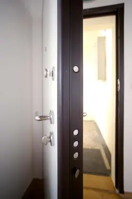 a door that is open to a room with a hallway at Skyscraper Apartment Tour As Ljubljana in Ljubljana