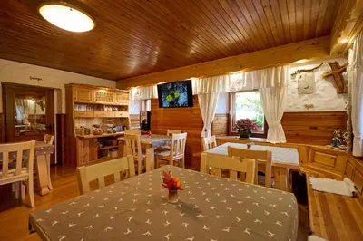a dining room with a table and chairs at Shepherds House 