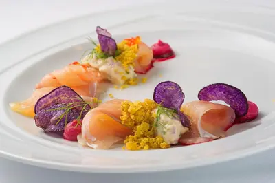 a plate of food on a white plate at Terme Zreče – Hotel Atrij in Zreče
