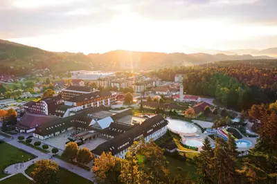 an aerial view of a town with a campus at Terme Zreče – Hotel Atrij in Zreče