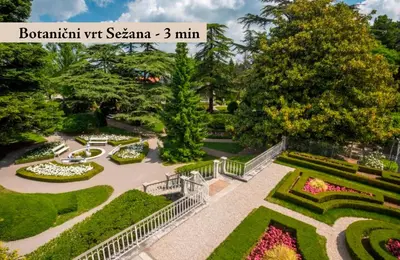 an aerial view of a park with flowers and trees at Safir Hotel Casino in Sežana