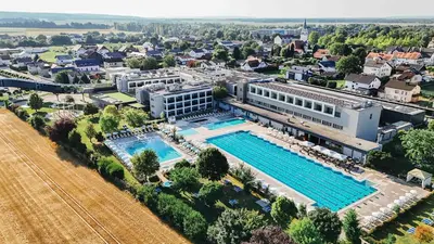 an overhead view of a large building with a pool at Hotel Vivat in Moravske Toplice