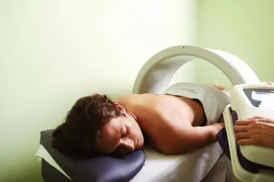 a naked woman laying in a mri machine at Hotel Vivat in Moravske Toplice