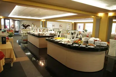 a buffet line in a restaurant with food at Grand Hotel Donat Superior & Wellness Center in Rogaška Slatina
