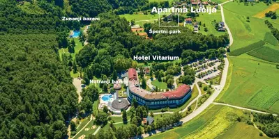 an aerial view of a building in a park at Apartment Lucija-Terme Šmarješke Toplice in Smarjeske Toplice