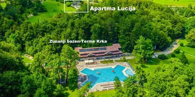 an aerial view of a house with a swimming pool at Apartment Lucija-Terme Šmarješke Toplice in Smarjeske Toplice