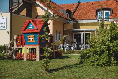 a small house in the yard of a house at Penzion Plac ob železnici in Loče pri Poljčanah