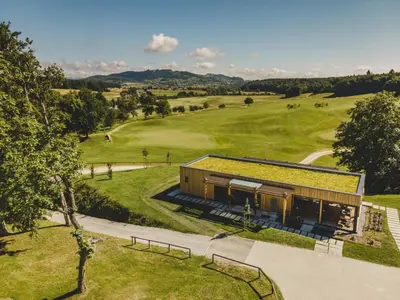 an overhead view of a building with grass on the roof at Hotel Grad Otočec - Relais Chateaux in Otočec