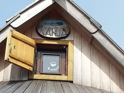 a sign on the side of a building at Chalet Kanja Velika Planina in Stahovica