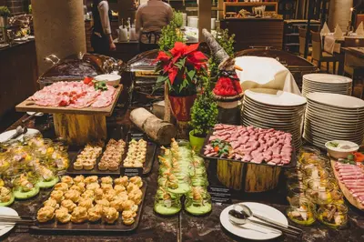 a buffet of different types of food on a table at Hotel Balnea Superior - Terme Krka in Dolenjske Toplice