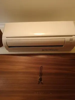 a laptop computer sitting on top of a table at Domačija Linč in Rodik