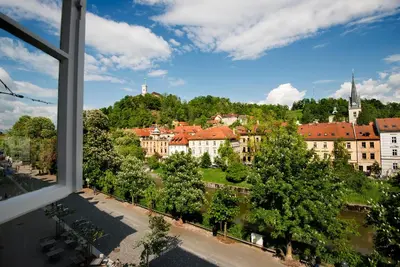 a view of a city from a window at Galeria River in Ljubljana