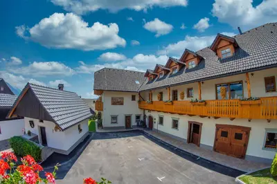 an aerial view of a house with a courtyard at Tourist Farm 