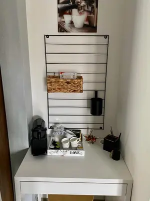 a white table with items on top of it at LizMari in Podčetrtek